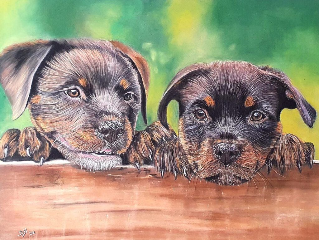 Tekening van twee puppy's zittend naast elkaar